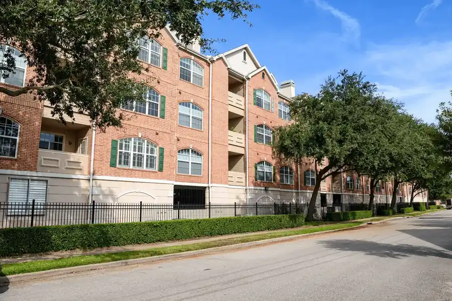 HOA perimeter fence — ornamental iron by Griffin Fence, Houston TX