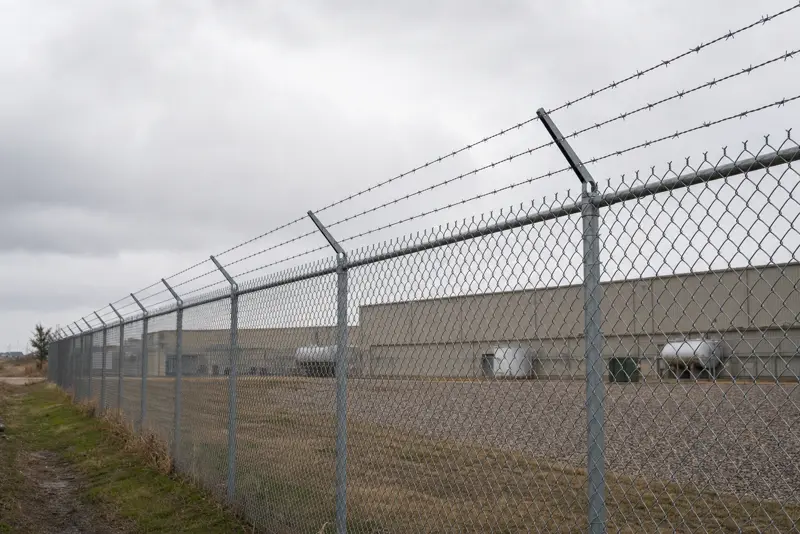 Barbed Wire Chain Link Fence Installation in Houston, TX