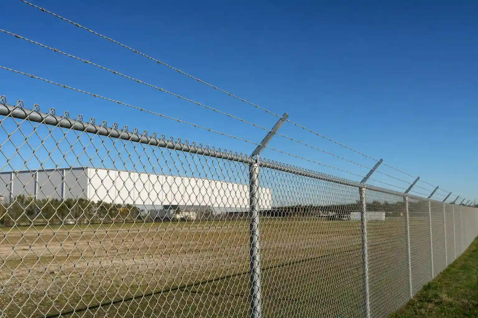 Chain Link Fence With Barbed Wire — Houston, TX Installation Guide
